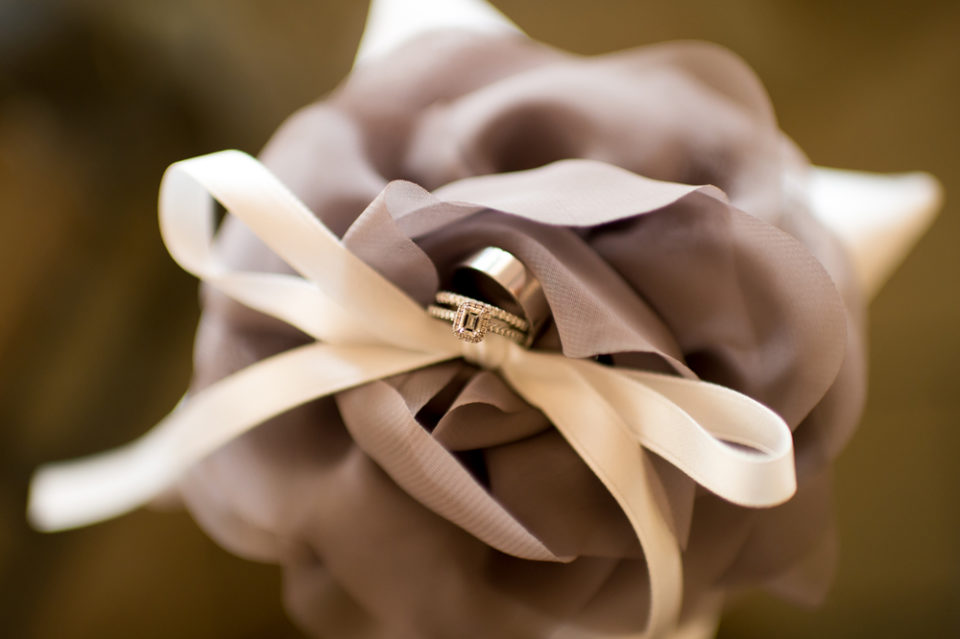 A ring sits inside a flower during Kevin and Ellery's Manor House wedding in Littleton, Colorado, on June 26, 2016.