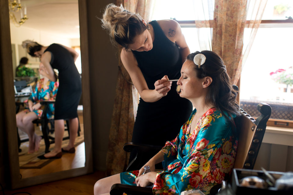 Ellery gets makeup on before her Manor House wedding on June 26, 2016, in Littleton, Colorado.