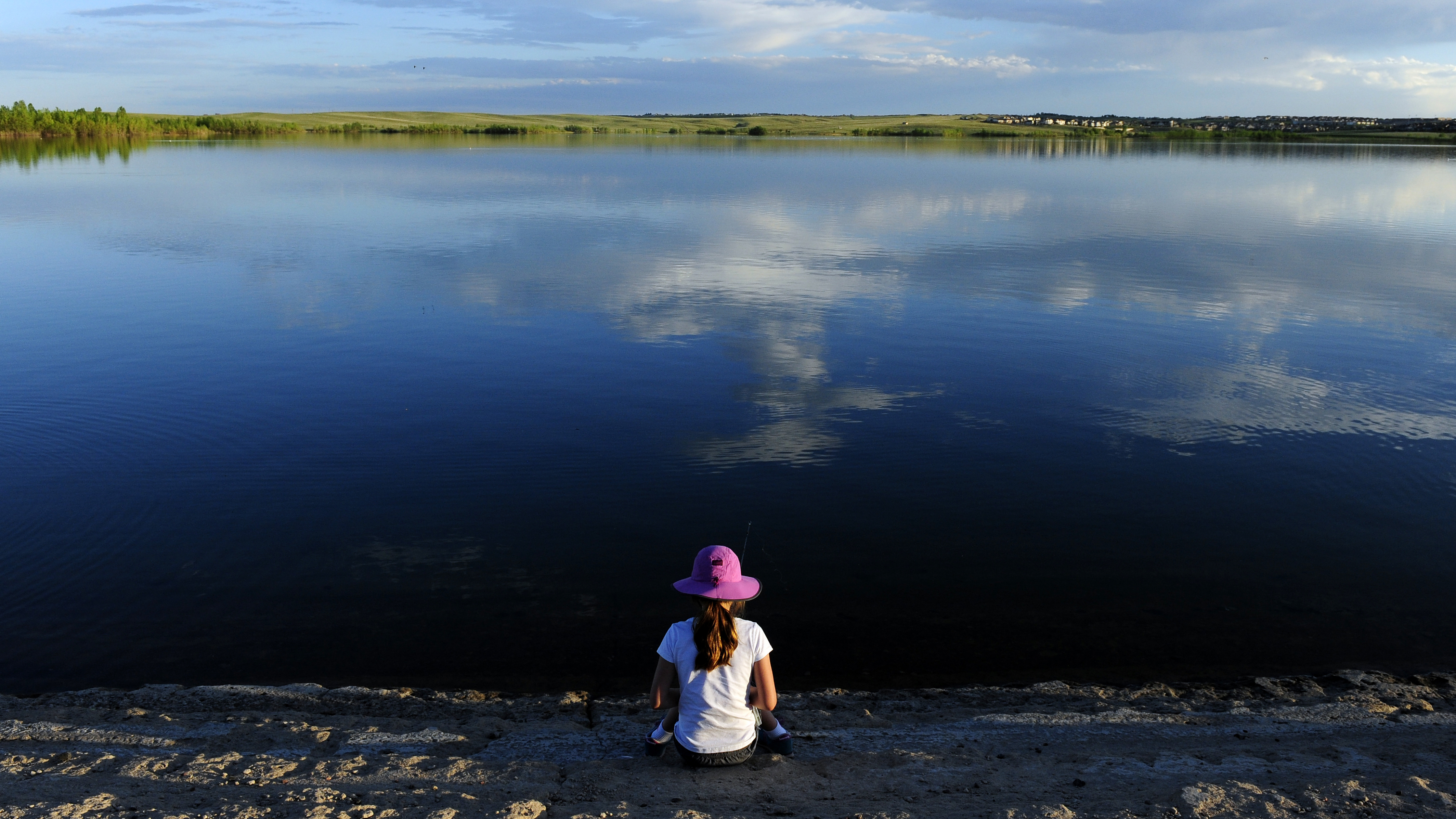 girl-fishing-at-reservoir