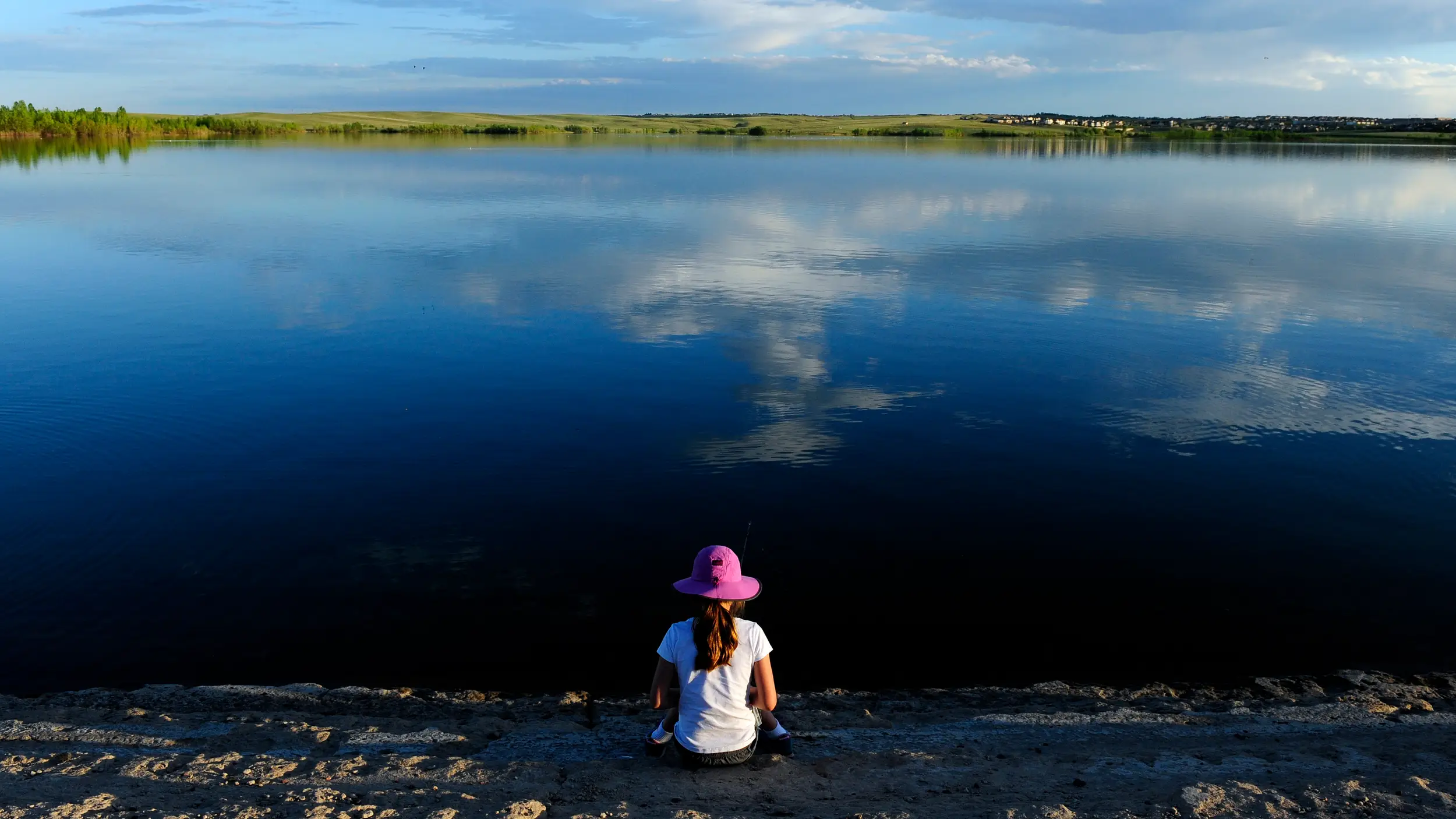 girl-fishing-at-reservoir