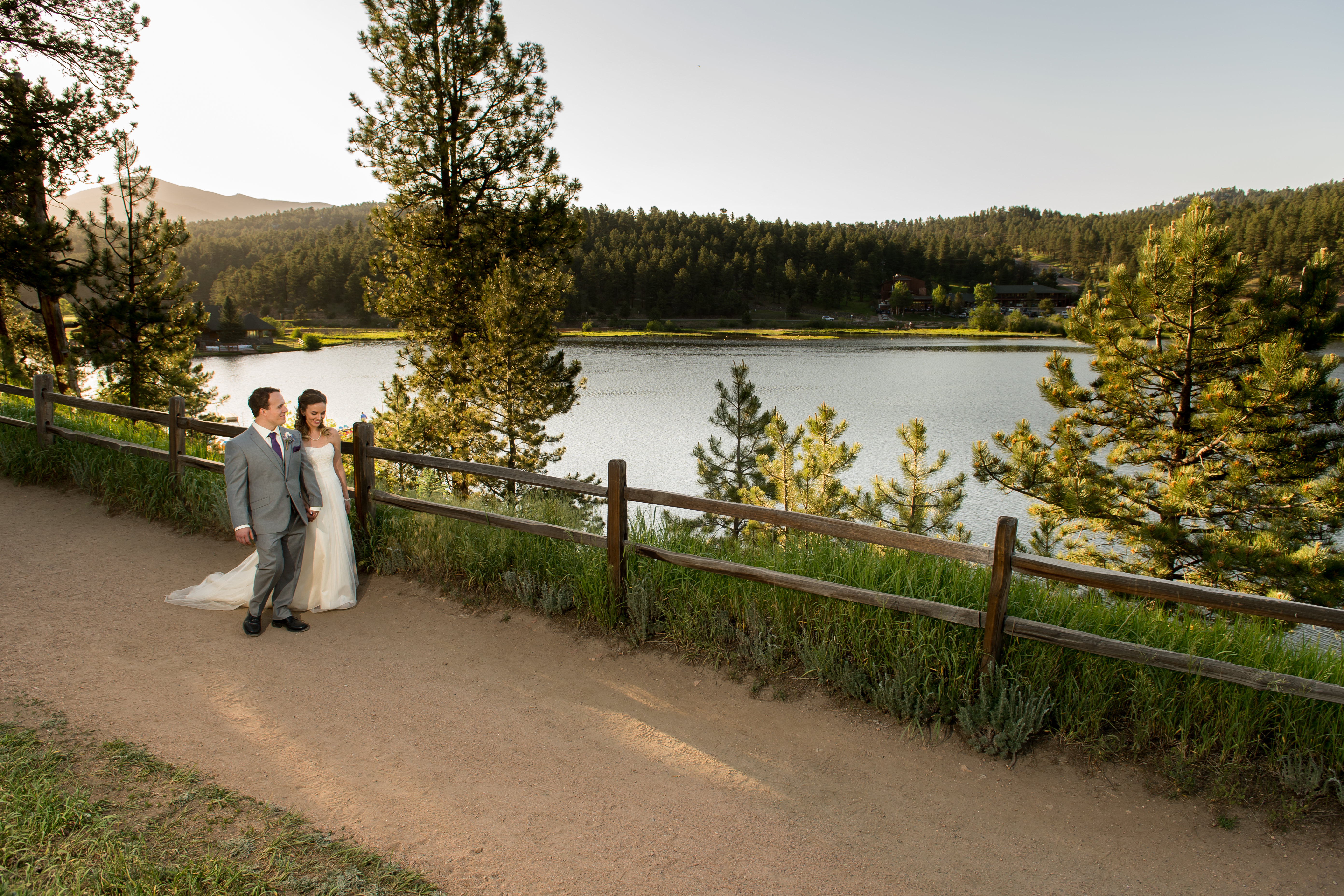 Evergreen Lake House wedding pictures of bride and groom walking