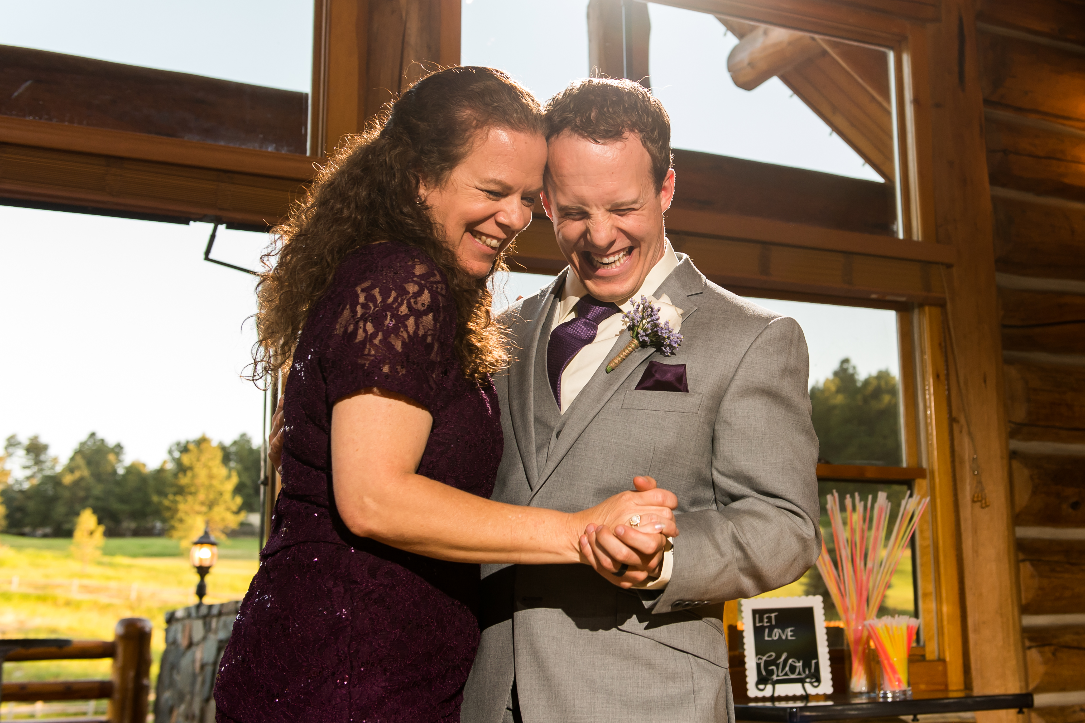 Evergreen Lake House wedding pictures of groom dancing with mother