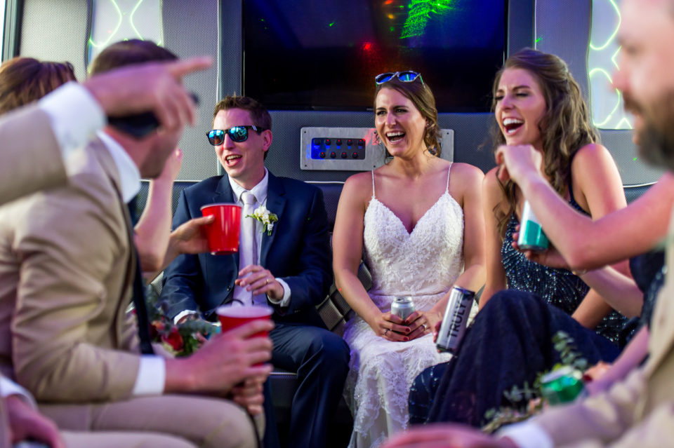 Inside the party bus during an Our Lady of Lourdes Denver wedding.