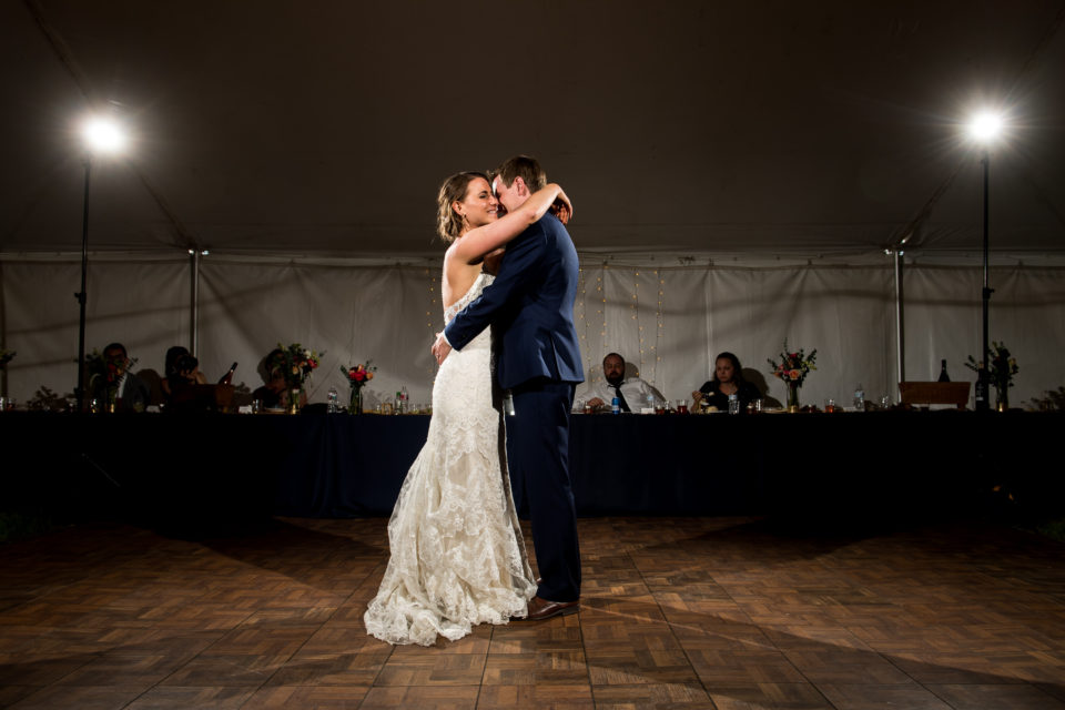 Bride and groom first dance during backyard wedding in Colorado