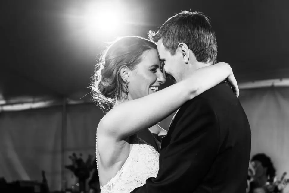 Bride and groom first dance during backyard wedding in Colorado