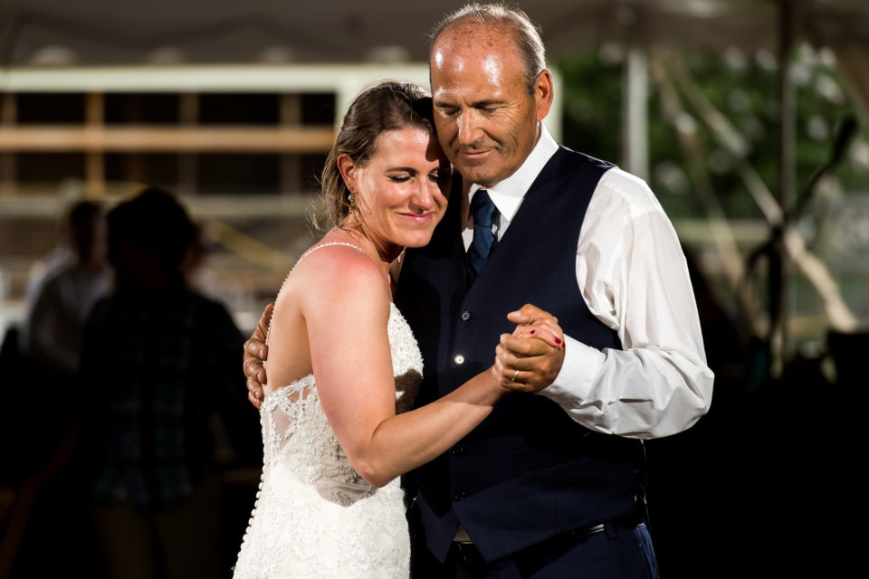 Father-daughter first dance during backyard wedding in Colorado