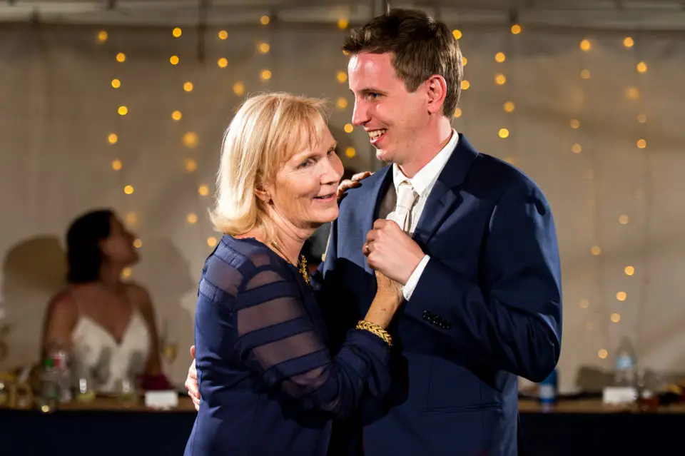 Mother-son first dance during backyard wedding in Colorado