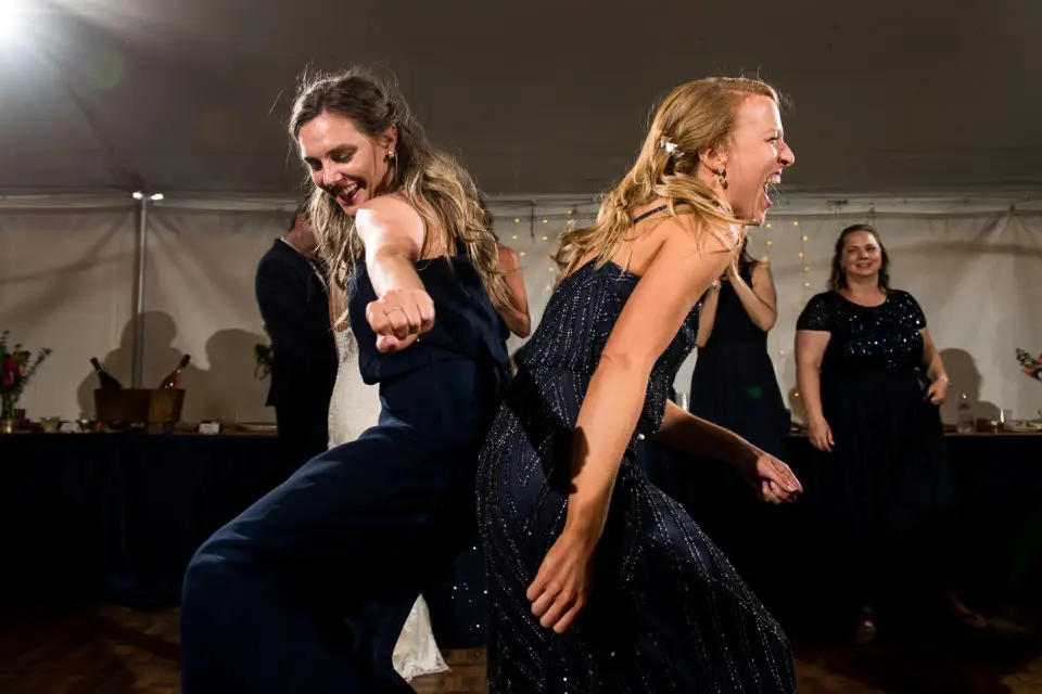 Dancing under the tent during a backyard wedding in Colorado