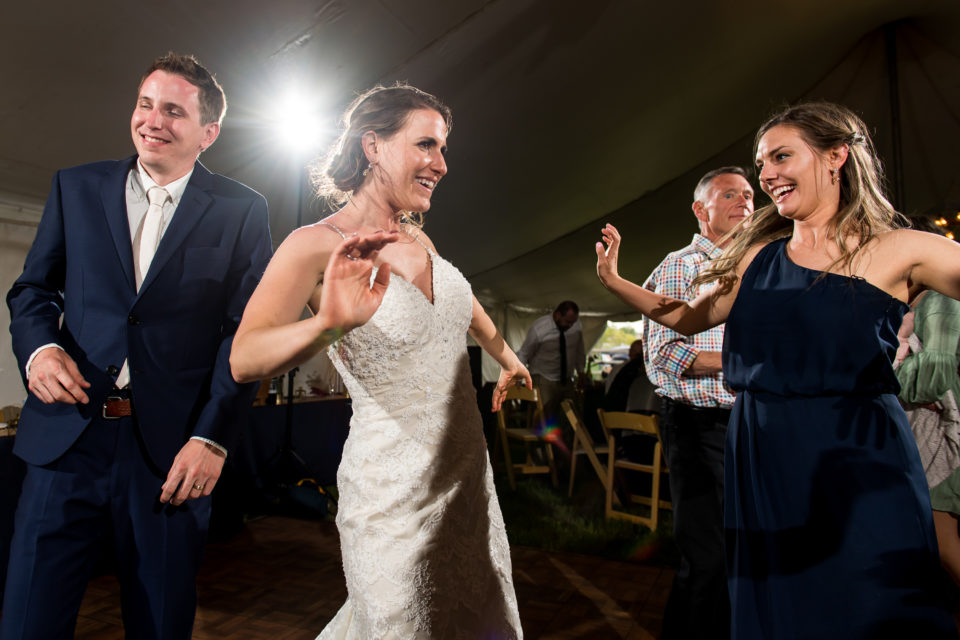 Dancing under the tent during a backyard wedding in Colorado