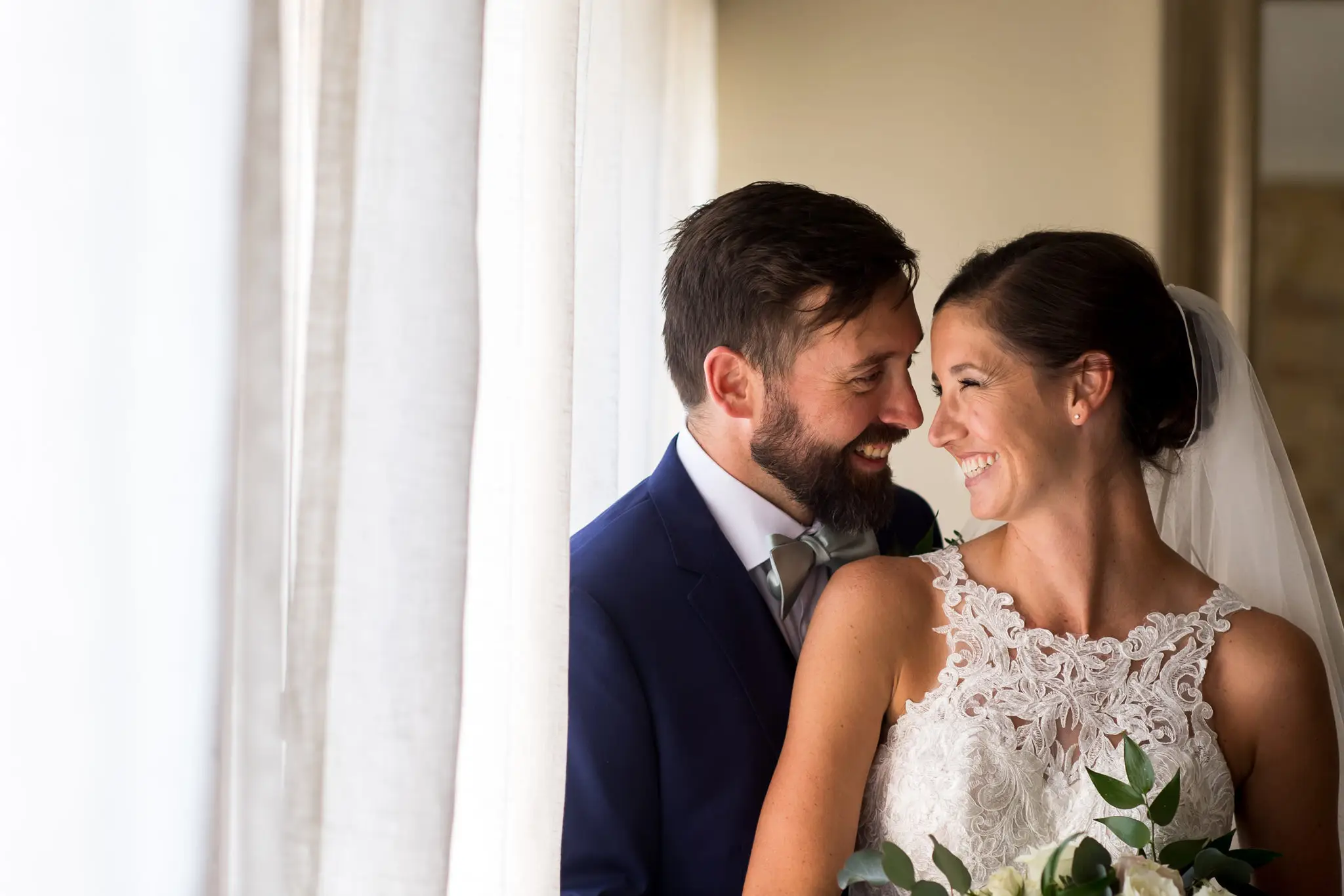 Posing in the bridal suite at Our Lady of Lourdes Catholic Church in Denver, Colorado
