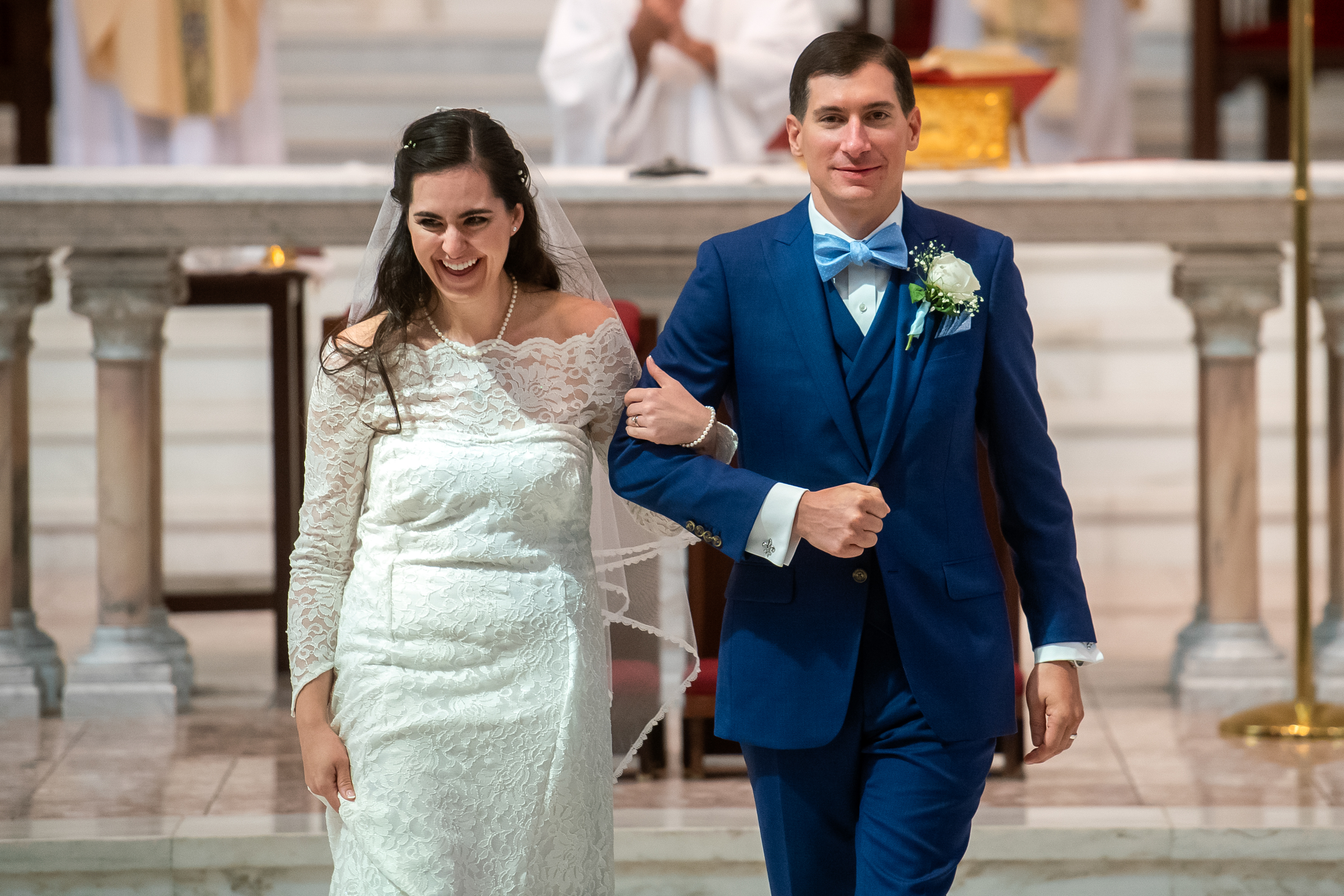 Aurora and Yann process out after their wedding at the Cathedral Basilica of the Immaculate Conception in Denver, Colorado.