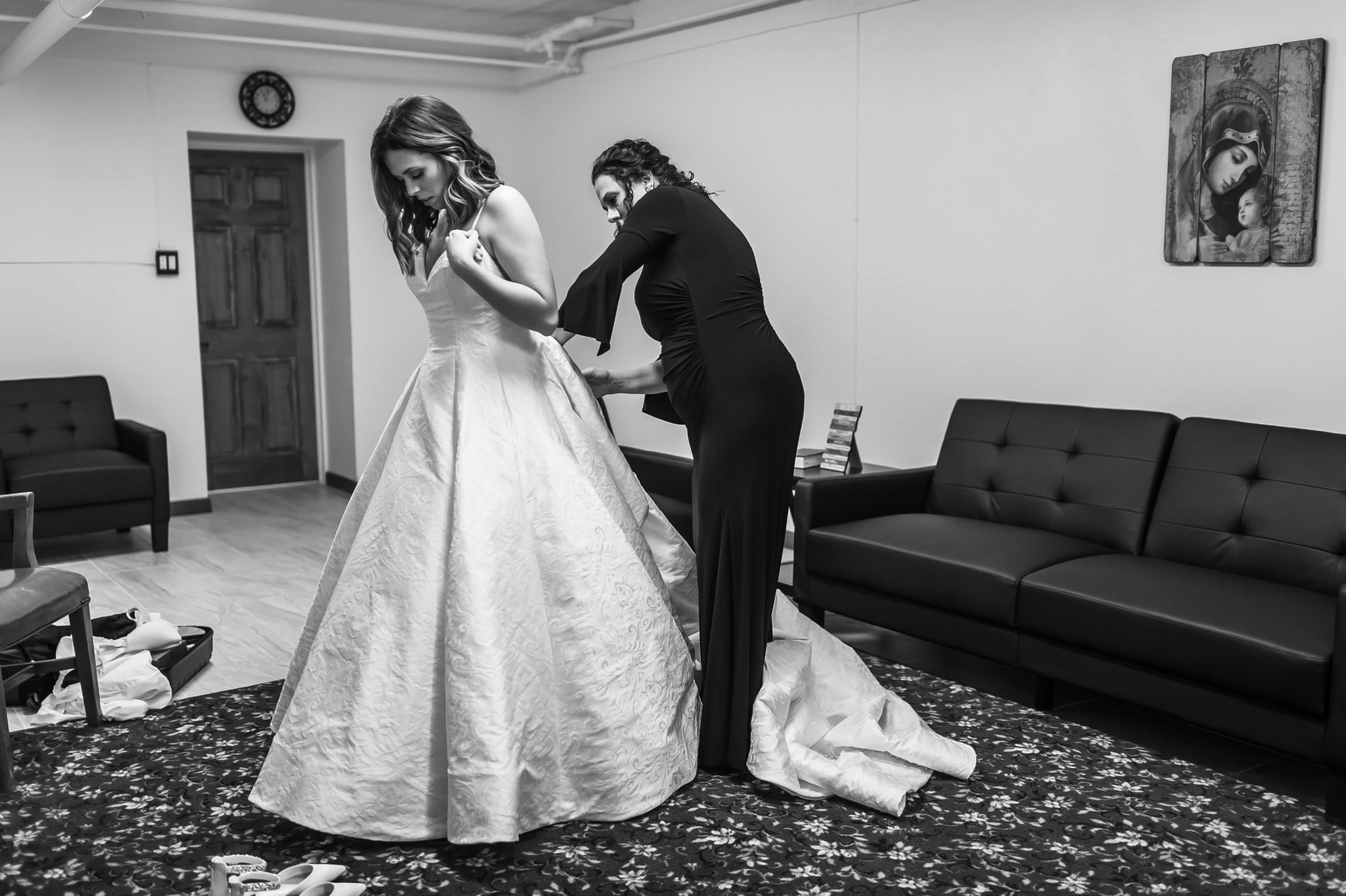 Bride gets ready during a Blessed Sacrament Denver wedding.