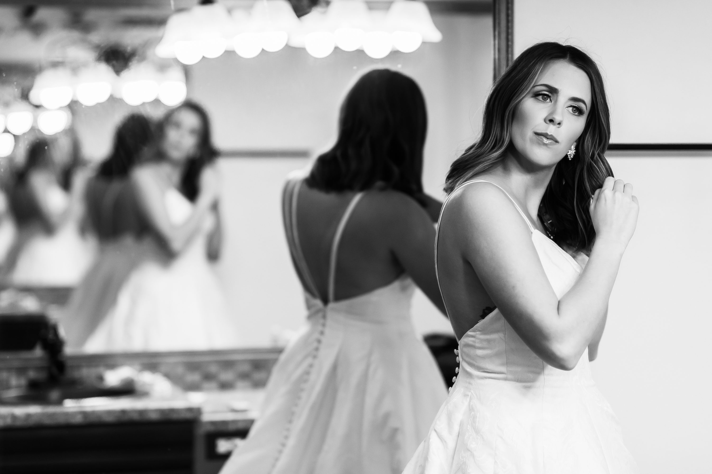 Bride gets ready during a Blessed Sacrament Denver wedding in Colorado.