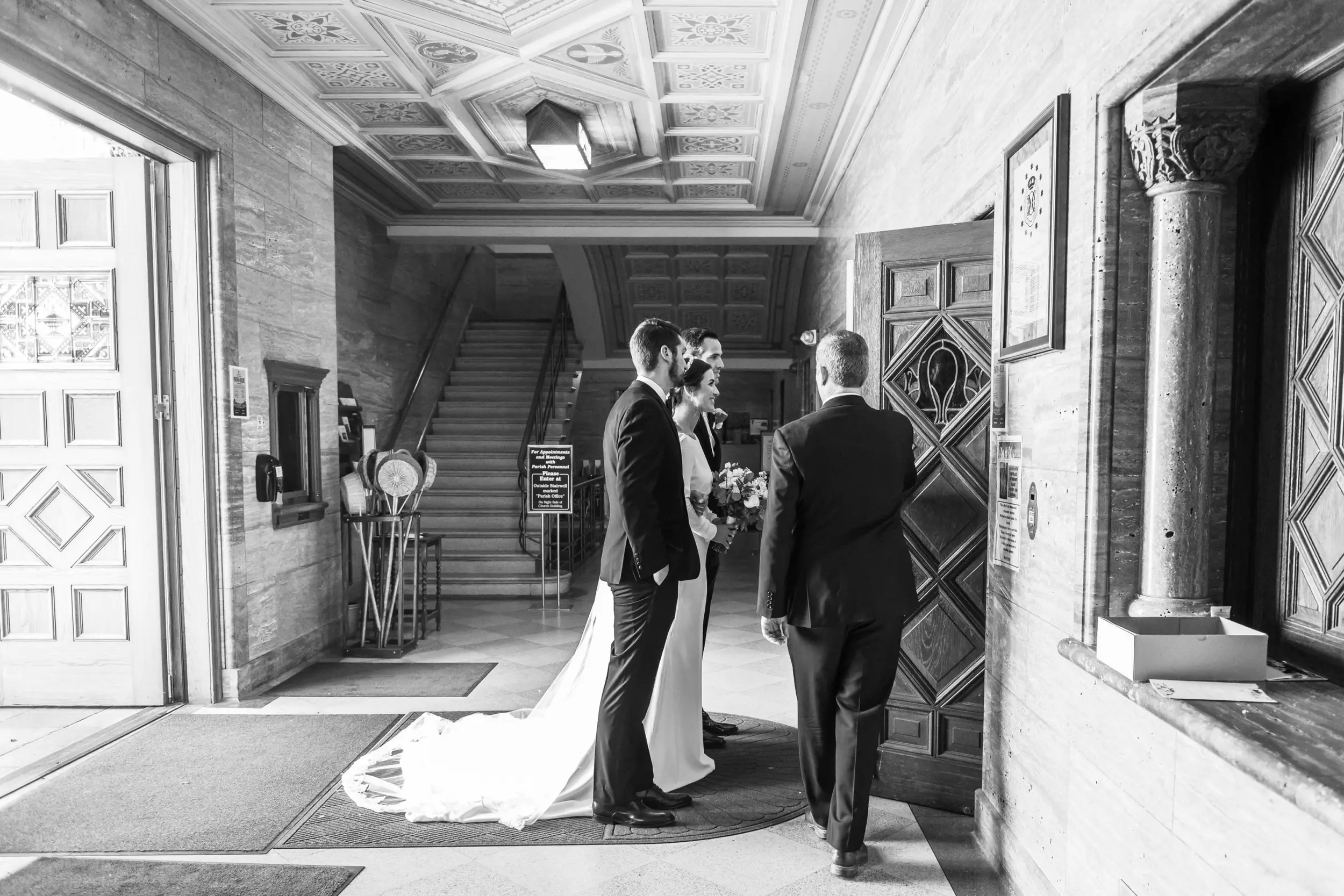 Bride prepares to walk down the aisle during her Holy Ghost Church Denver Wedding in Denver, Colorado.