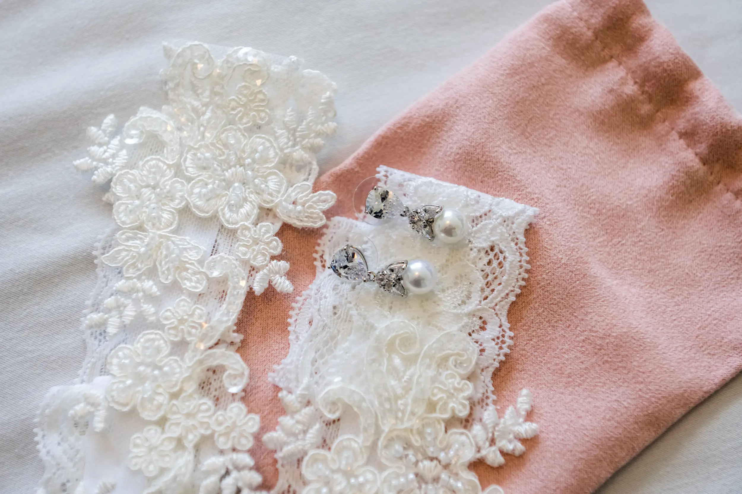 Earrings on display for a Holy Ghost Church Denver Wedding in Denver, Colorado.