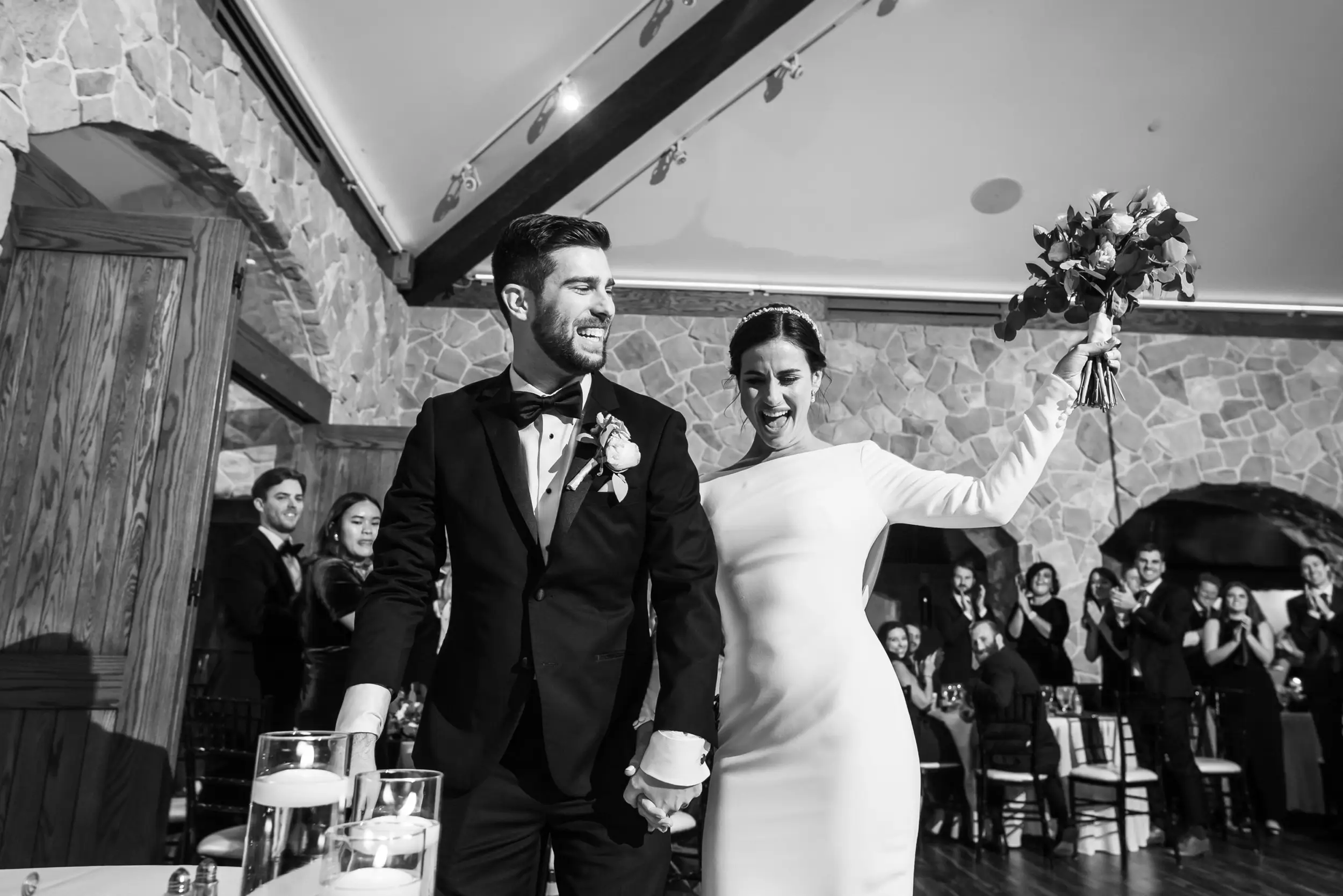Bride and groom process in at Baldoria on the Water wedding venue in Lakewood, Colorado.