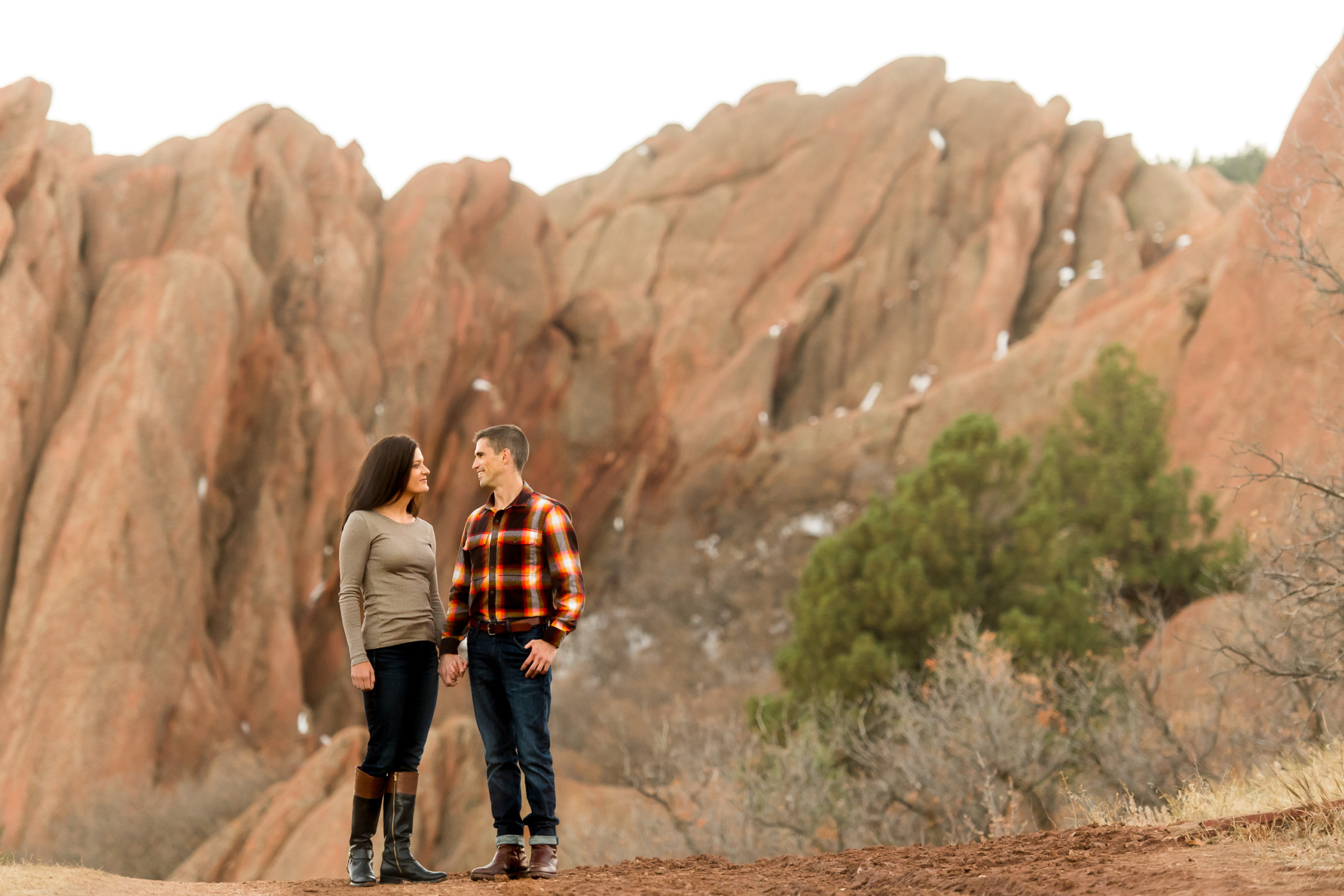 Victoria and Justin stand inside Roxborough State Park Littleton for their engagement session.
