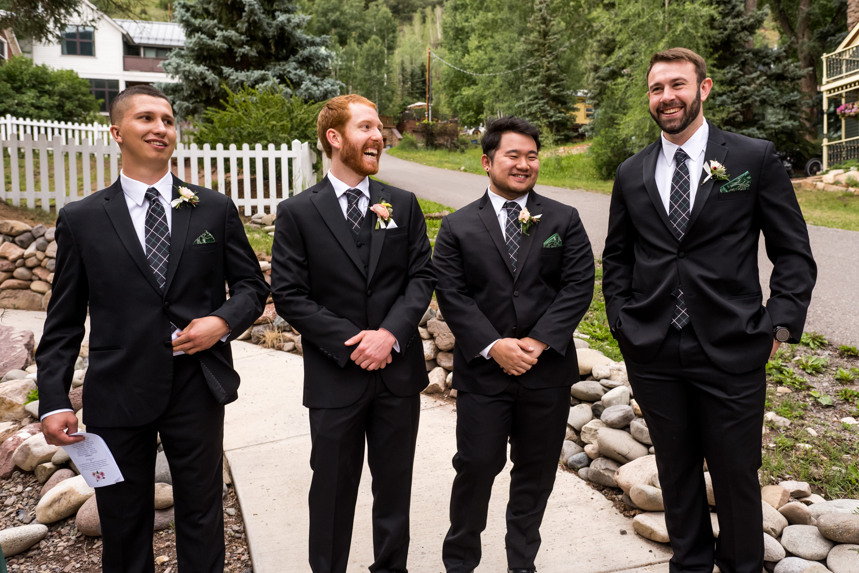 The groom and groomsmen look on during a wedding at St. Patrick's Church Telluride.