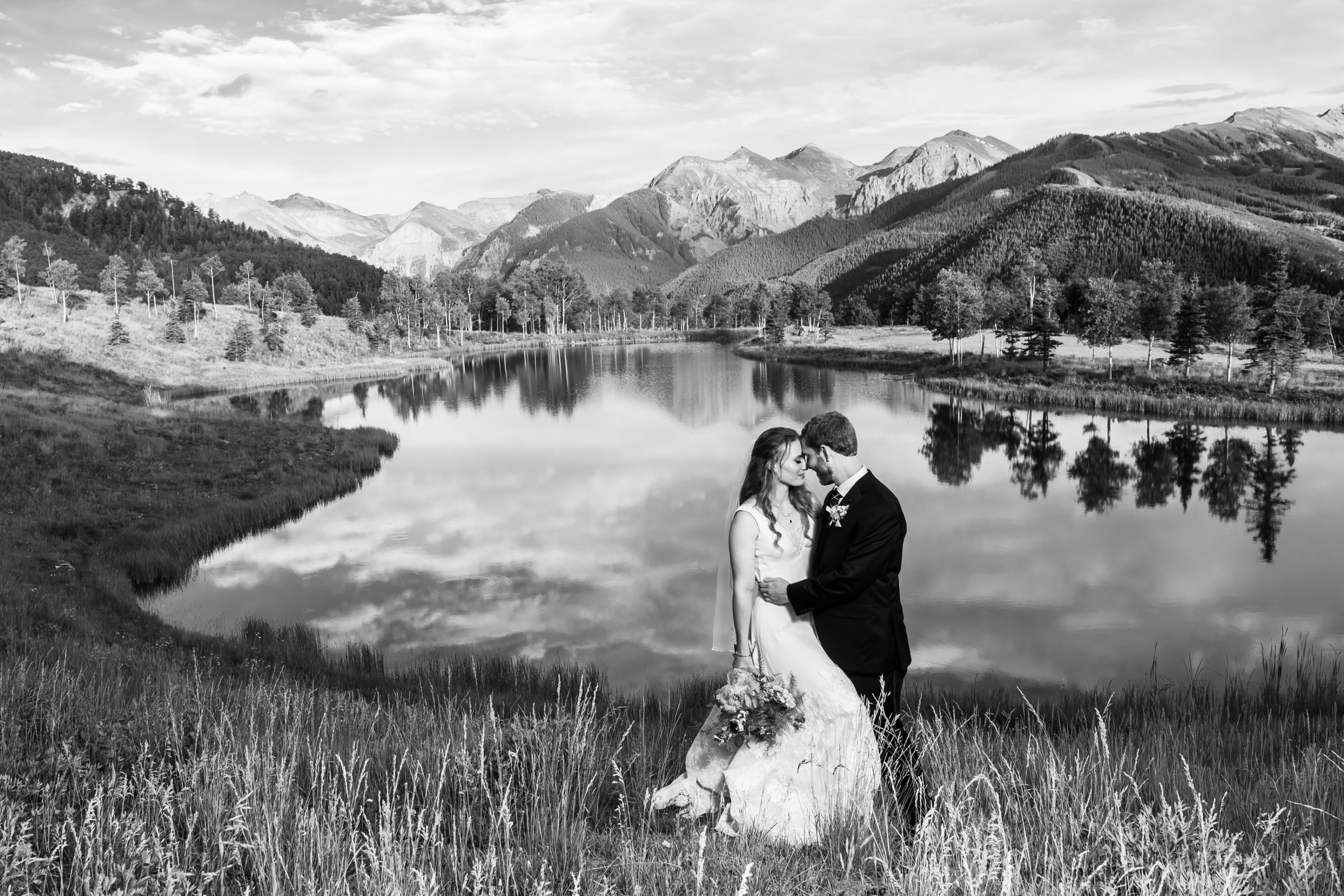 The bride and groom embrace during their Telluride, Colorado, wedding.