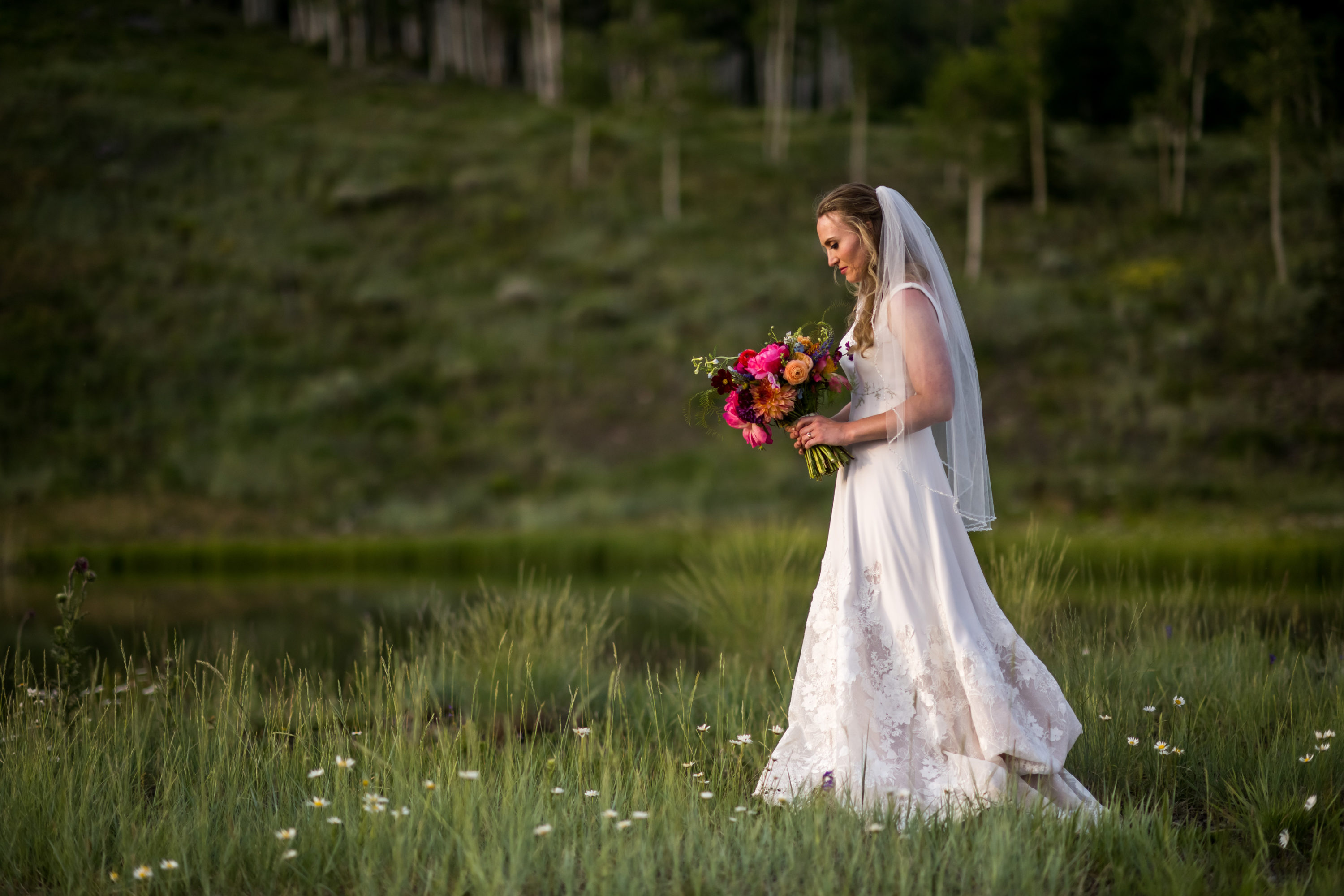 The bride poses at sunset during Telluride, Colorado, wedding.