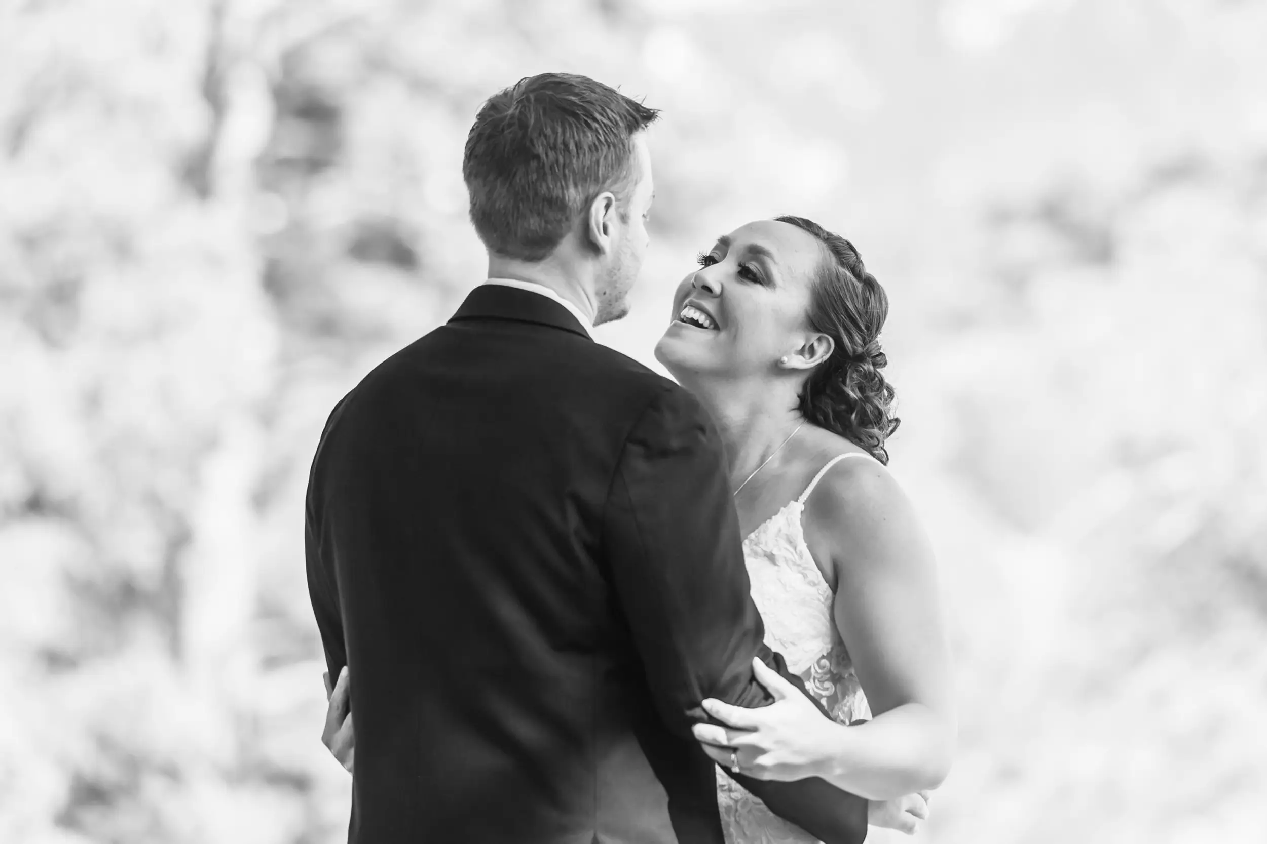 The bride and groom first look during their YMCA of the Rockies wedding in Estes Park, Colorado.