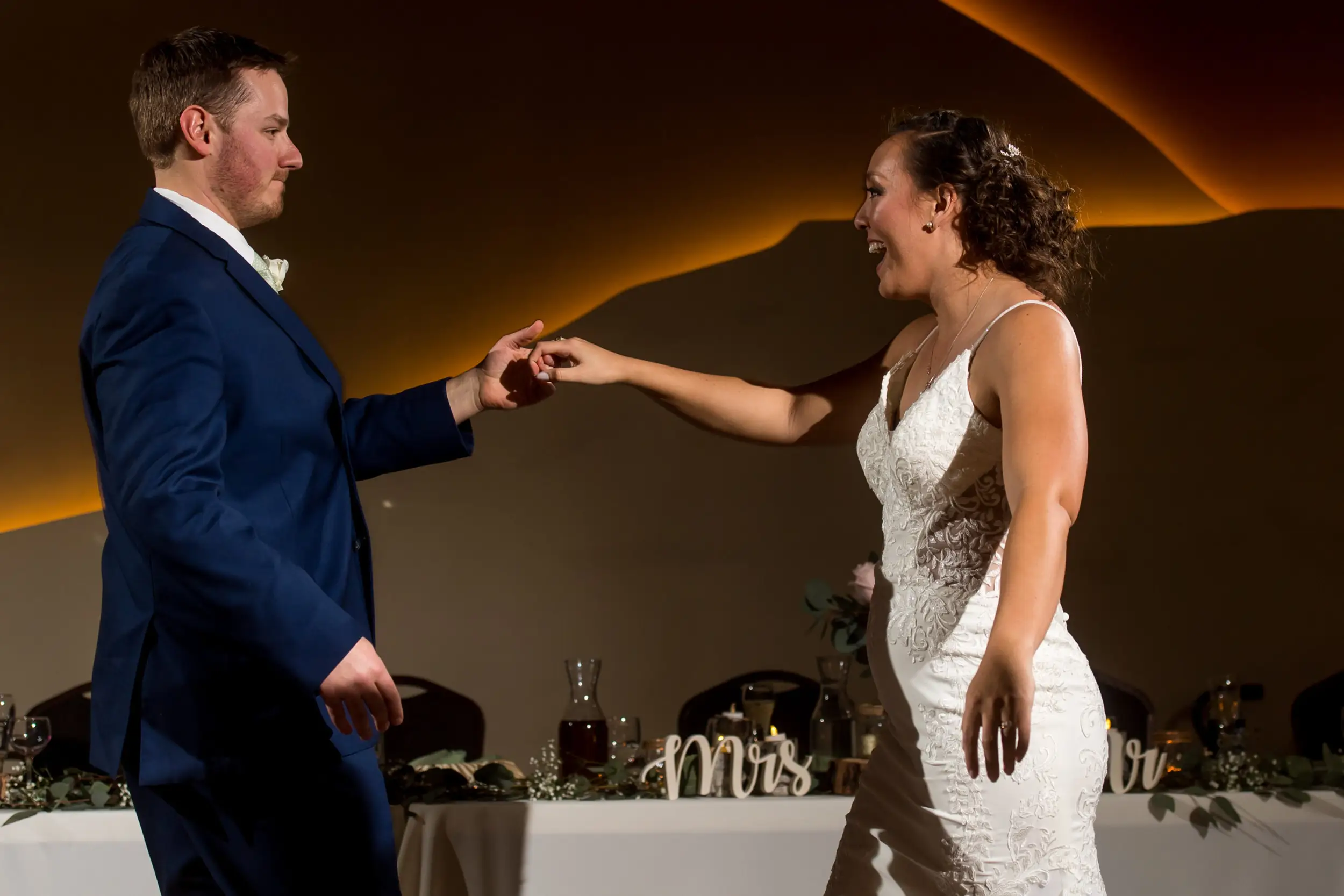 The bride and groom dance during their YMCA of the Rockies wedding in Estes Park, Colorado.