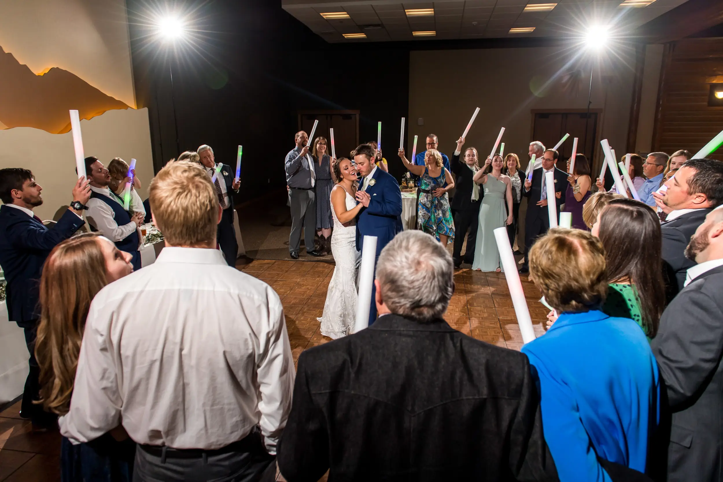 The bride and groom dance during their YMCA of the Rockies wedding in Estes Park, Colorado.