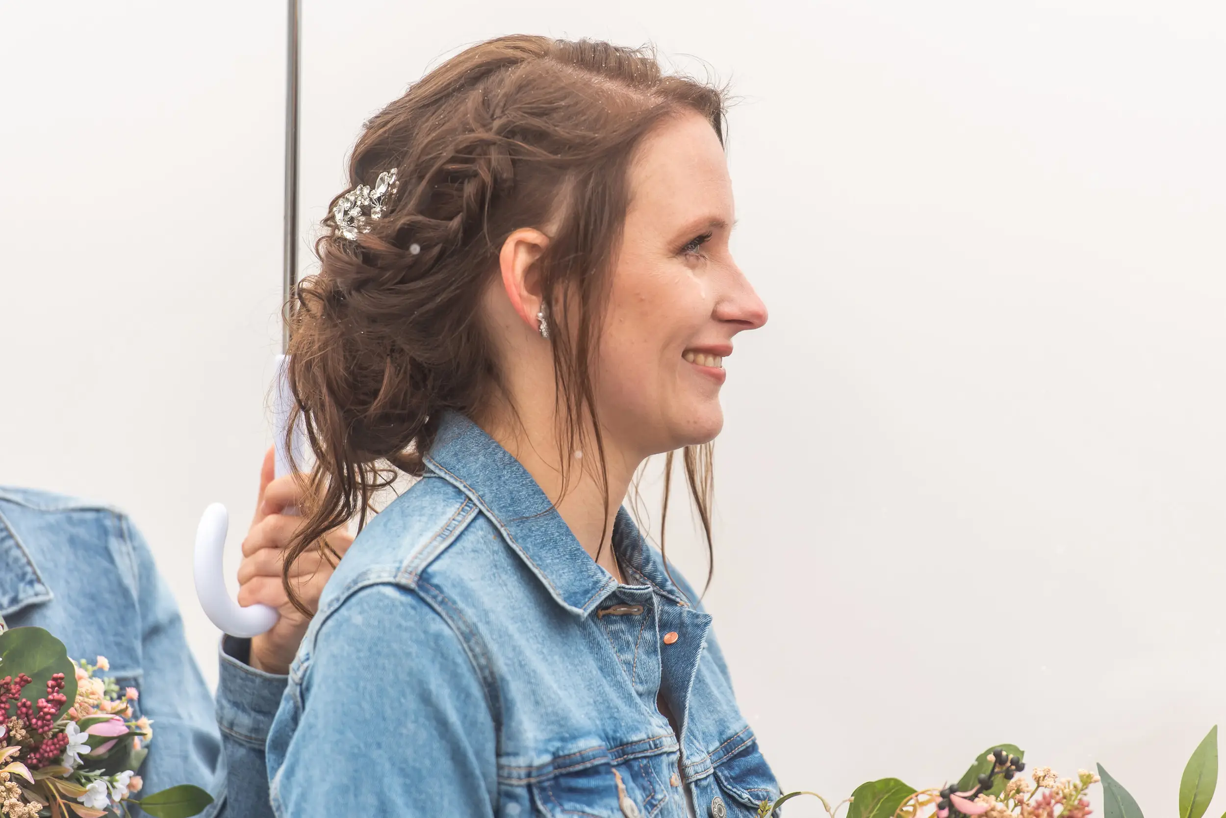 Liz cries during her Roxborough State Park wedding at Lyons Overlook in the snow.