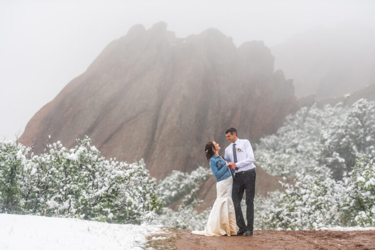 Andrew and Liz at Roxborough State Park wedding at Lyons Overlook in the snow.